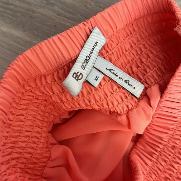 BCBG generation scalloped peach shorts.