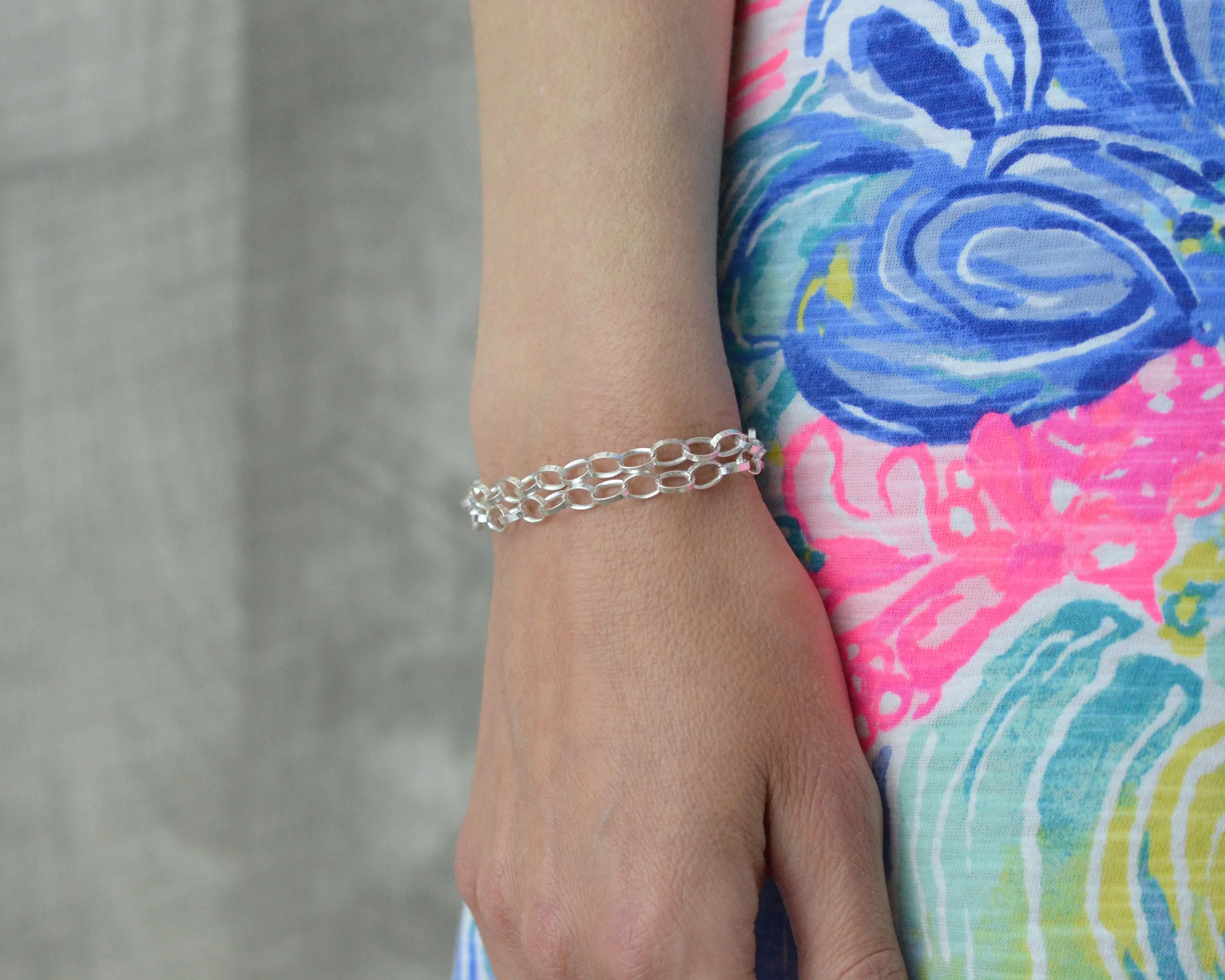 LAYERED STERLING SILVER CHARM BRACELET