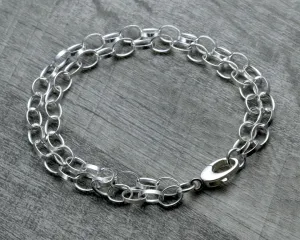 LAYERED STERLING SILVER CHARM BRACELET