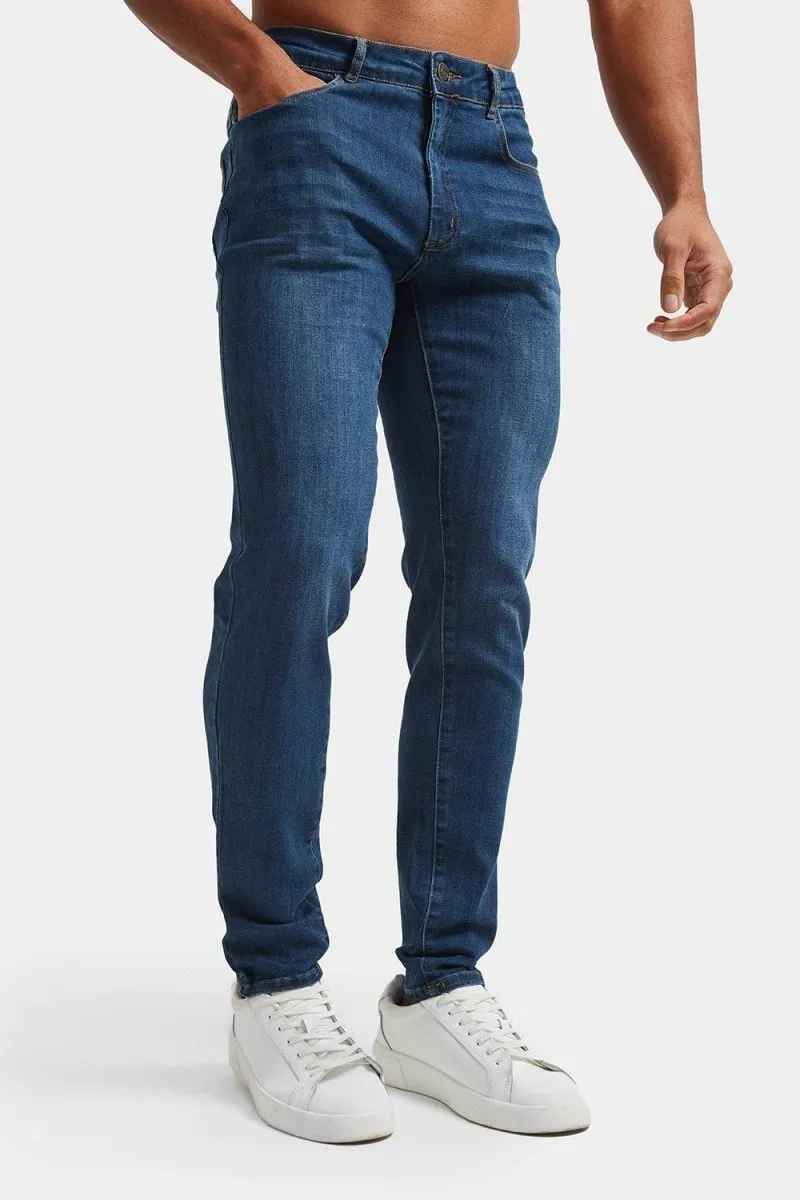 Muscle Fit Jeans in Dark Blue