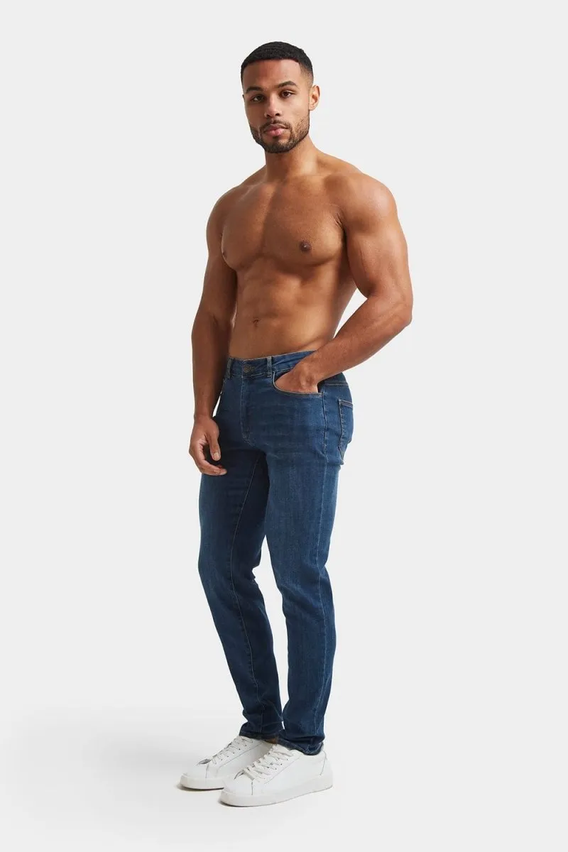 Muscle Fit Jeans in Dark Blue