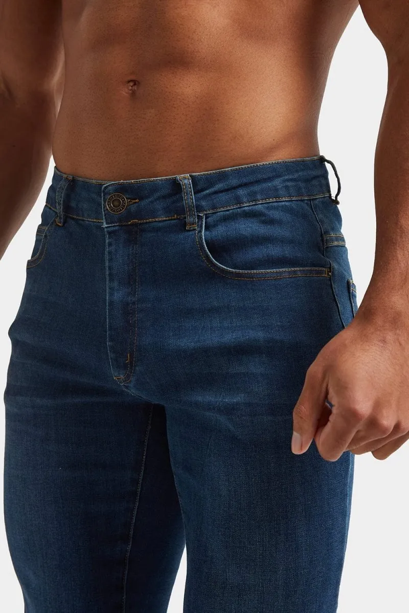 Muscle Fit Jeans in Dark Blue