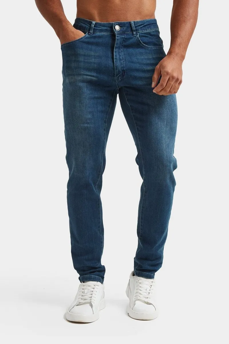 Muscle Fit Jeans in Mid Blue