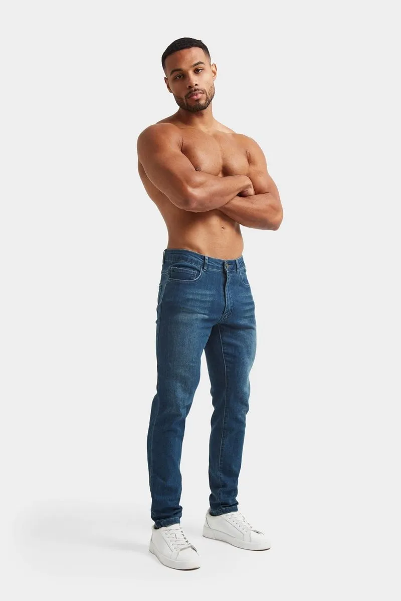 Muscle Fit Jeans in Mid Blue