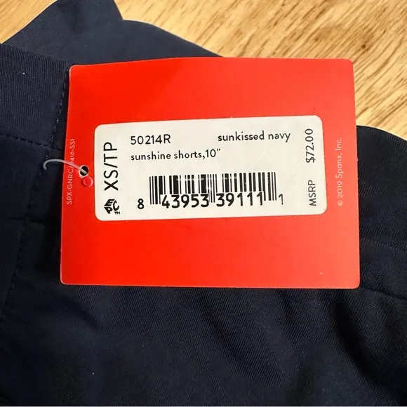SPANX Sunshine Shorts 10” in Sunkissed Navy size XS NWT Moisture Wicking