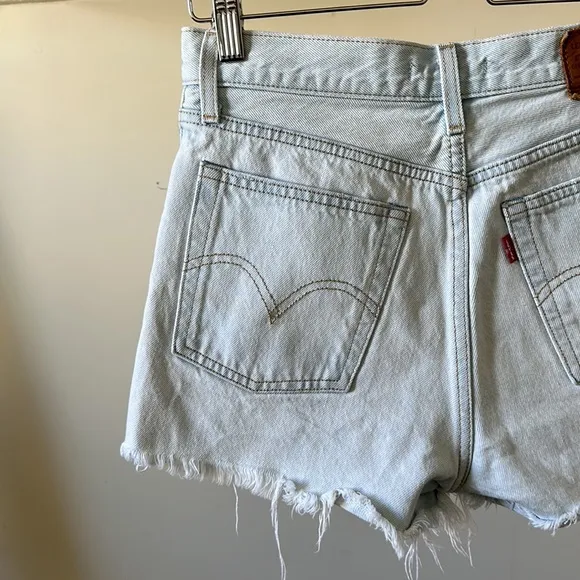 Vintage Levi’s wedgie button fly high rise frayed distressed rigid denim shorts