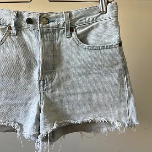 Vintage Levi’s wedgie button fly high rise frayed distressed rigid denim shorts