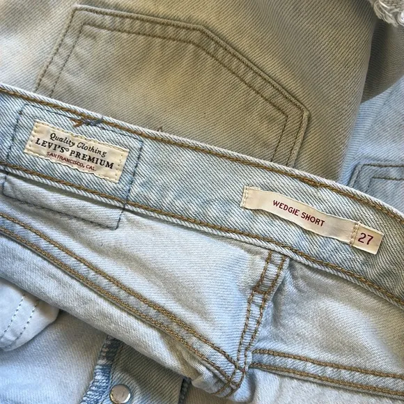 Vintage Levi’s wedgie button fly high rise frayed distressed rigid denim shorts